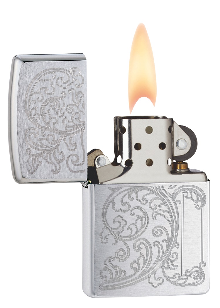 Front shot of Zippo Bejeweled Beetle Design High Polish Brass Windproof Lighter standing at a 3/4 angle.