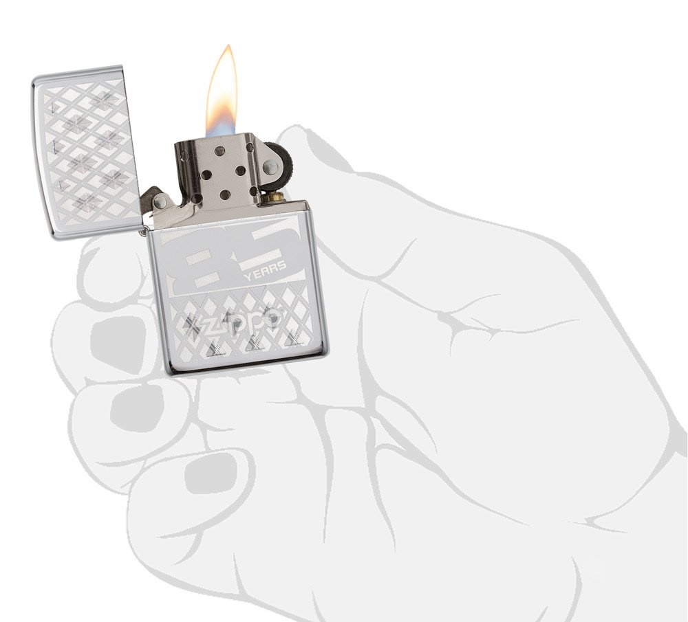 Front shot of Zippo Bejeweled Beetle Design High Polish Brass Windproof Lighter standing at a 3/4 angle.