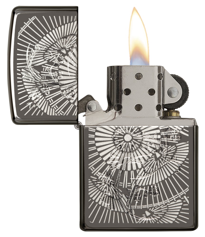 Front shot of Zippo Bejeweled Beetle Design High Polish Brass Windproof Lighter standing at a 3/4 angle.