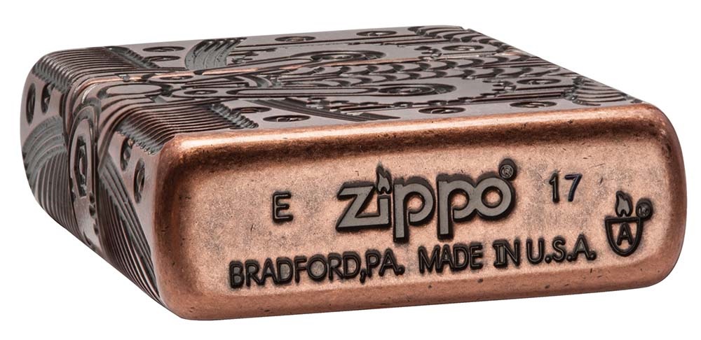 Front shot of Zippo Bejeweled Beetle Design High Polish Brass Windproof Lighter standing at a 3/4 angle.