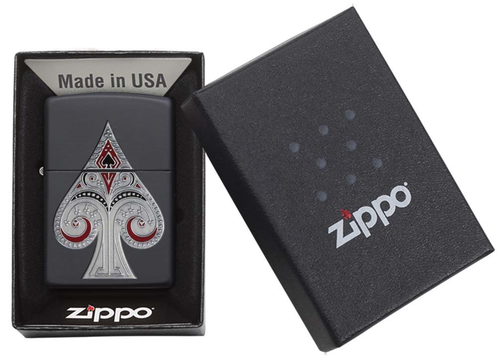 Front shot of Zippo Bejeweled Beetle Design High Polish Brass Windproof Lighter standing at a 3/4 angle.