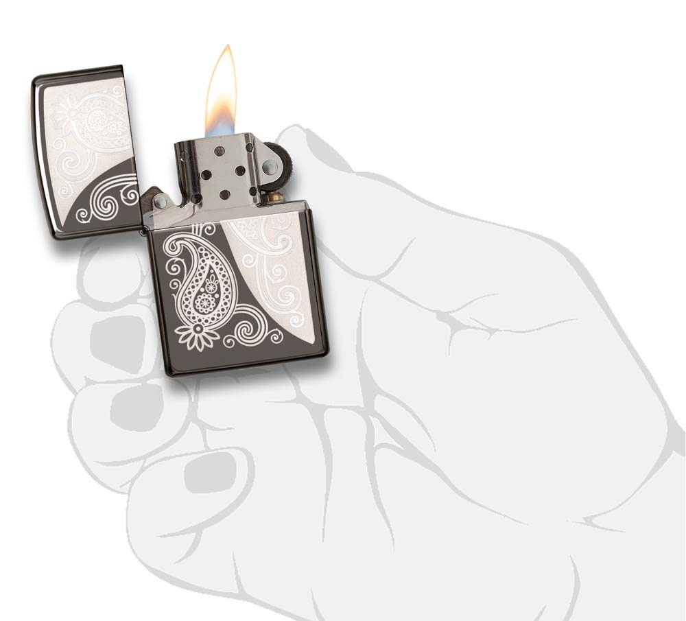 Front shot of Zippo Bejeweled Beetle Design High Polish Brass Windproof Lighter standing at a 3/4 angle.