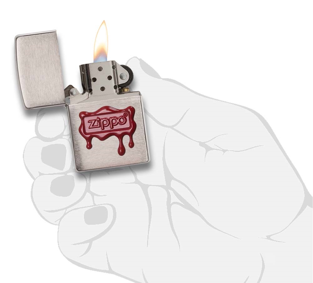 Front shot of Zippo Bejeweled Beetle Design High Polish Brass Windproof Lighter standing at a 3/4 angle.