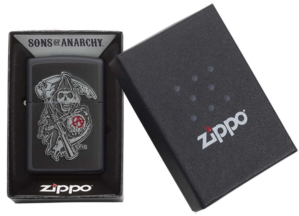 Front shot of Zippo Bejeweled Beetle Design High Polish Brass Windproof Lighter standing at a 3/4 angle.