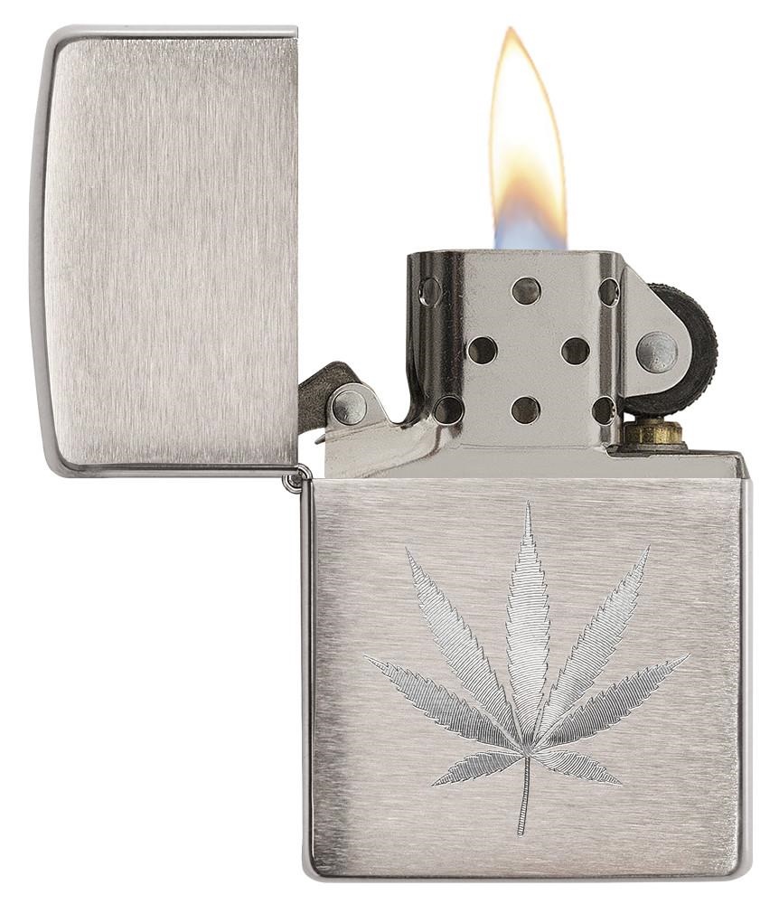 Front shot of Zippo Bejeweled Beetle Design High Polish Brass Windproof Lighter standing at a 3/4 angle.