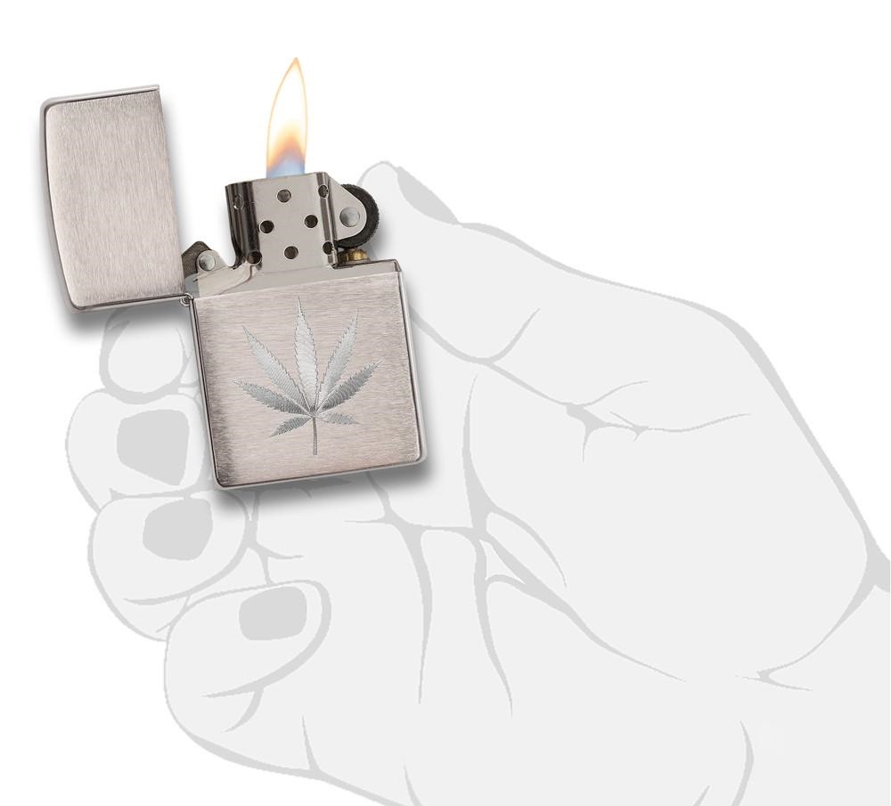 Front shot of Zippo Bejeweled Beetle Design High Polish Brass Windproof Lighter standing at a 3/4 angle.