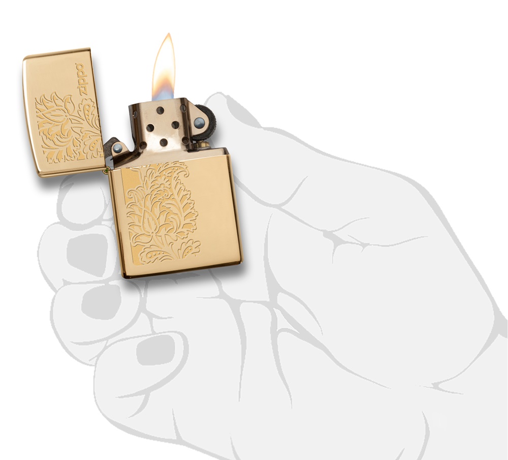 Front shot of Zippo Bejeweled Beetle Design High Polish Brass Windproof Lighter standing at a 3/4 angle.