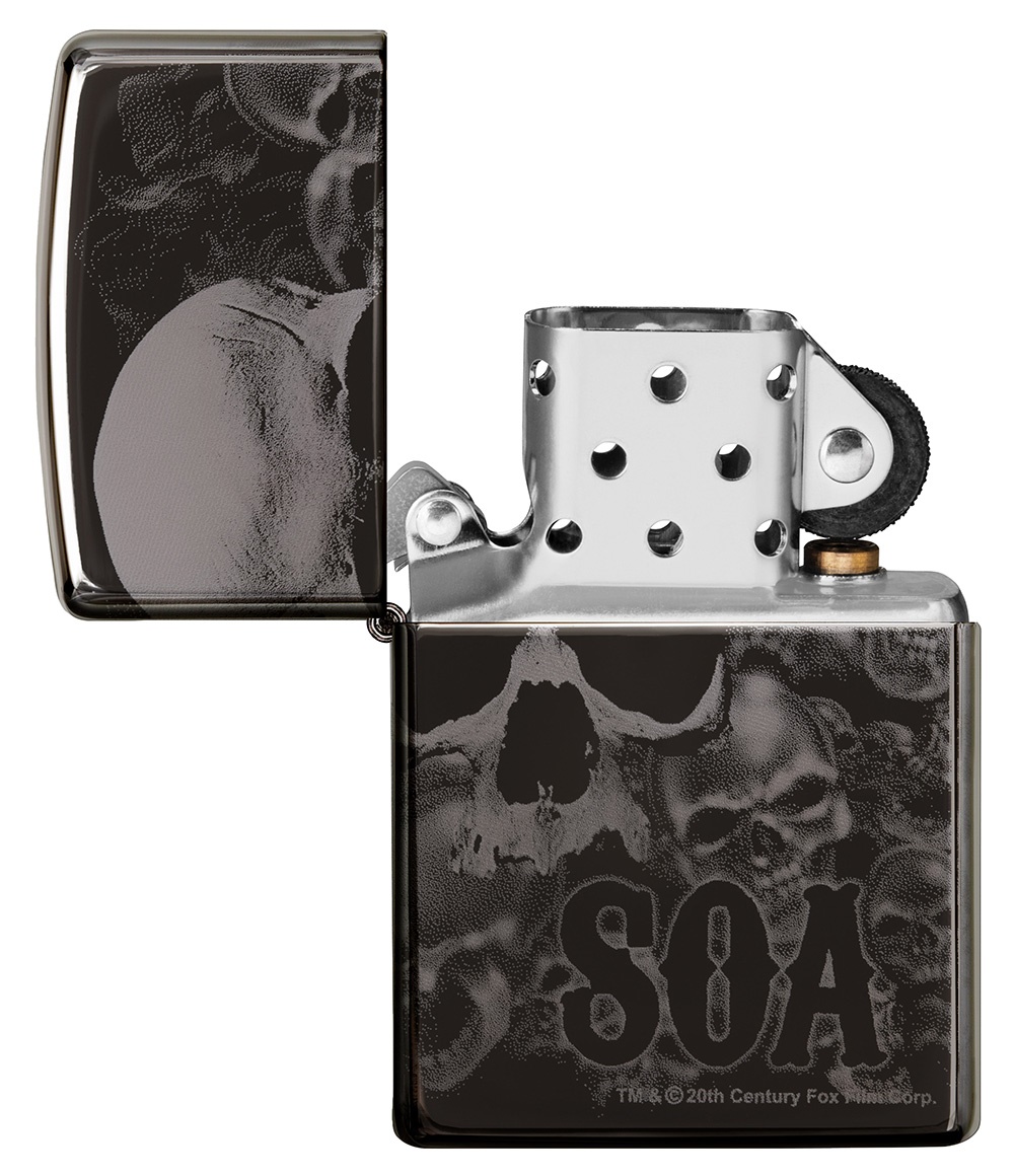 Front shot of Zippo Bejeweled Beetle Design High Polish Brass Windproof Lighter standing at a 3/4 angle.