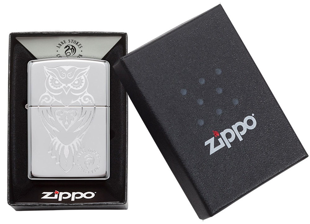 Front shot of Zippo Bejeweled Beetle Design High Polish Brass Windproof Lighter standing at a 3/4 angle.