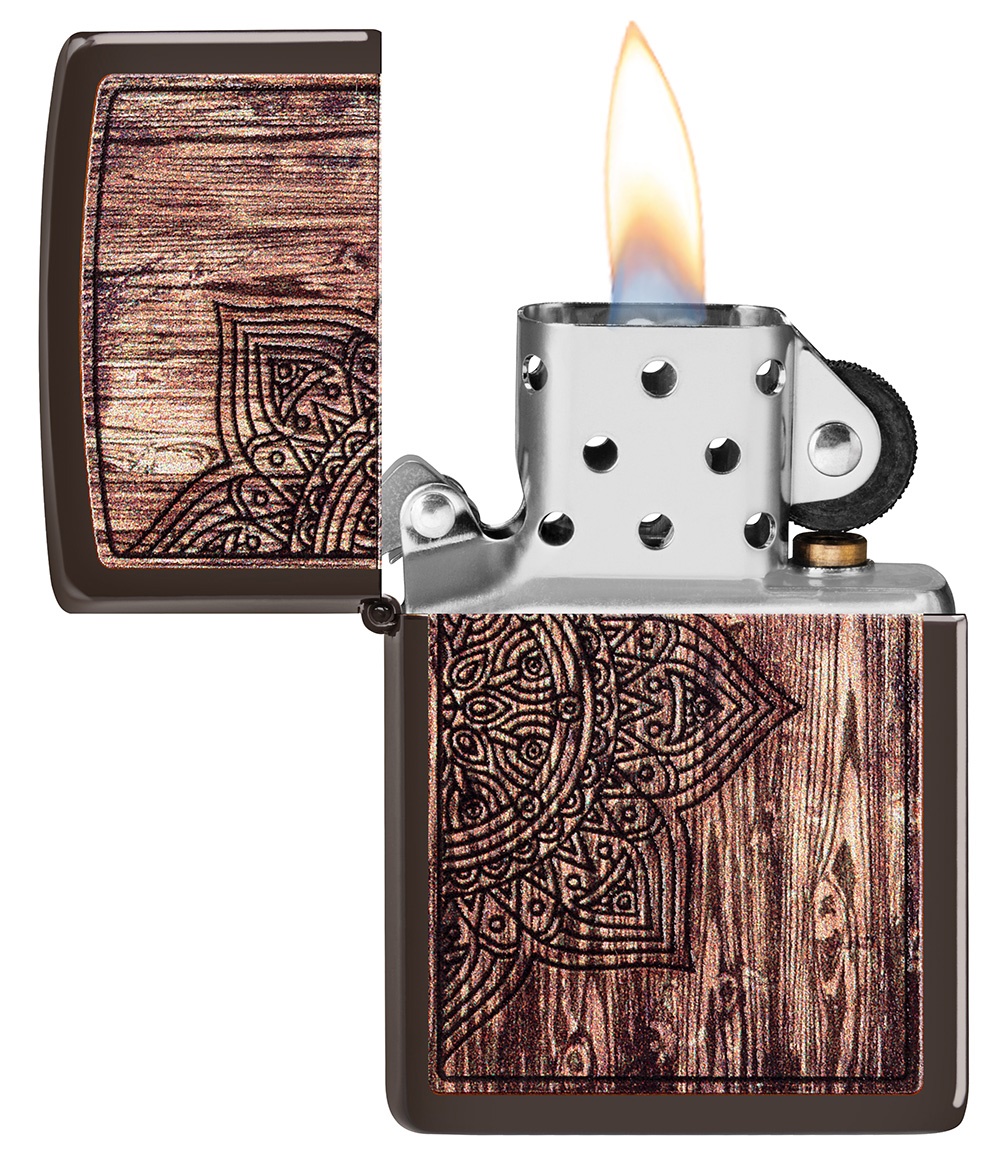 Front shot of Zippo Bejeweled Beetle Design High Polish Brass Windproof Lighter standing at a 3/4 angle.