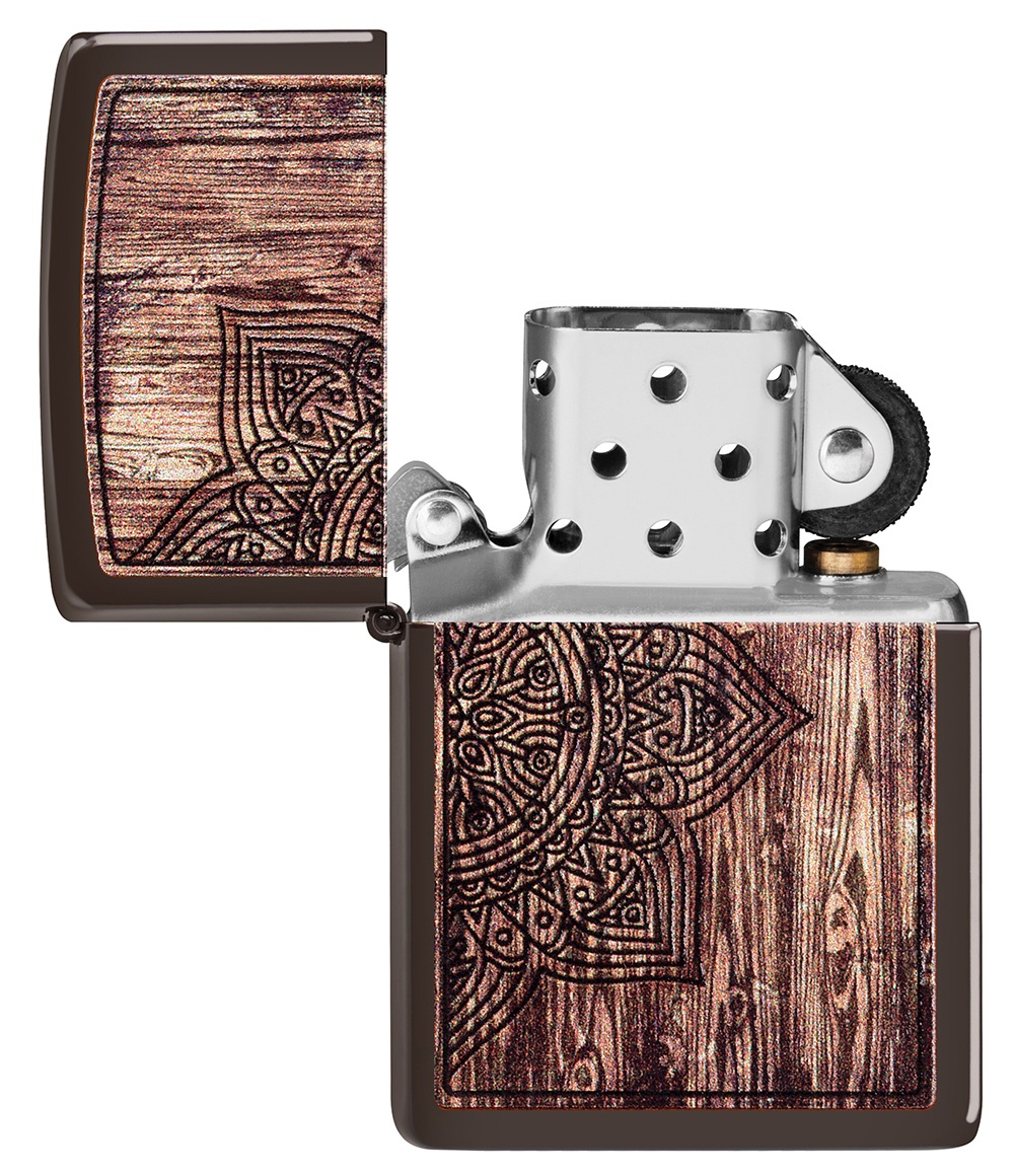 Front shot of Zippo Bejeweled Beetle Design High Polish Brass Windproof Lighter standing at a 3/4 angle.