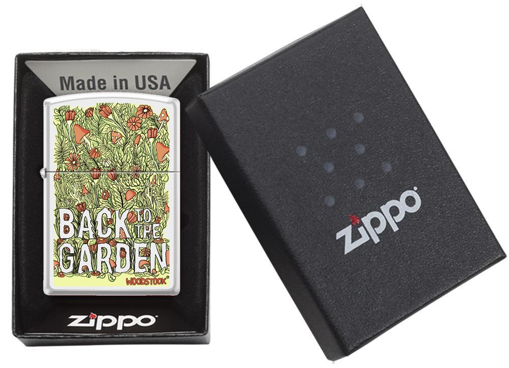 Front shot of Zippo Bejeweled Beetle Design High Polish Brass Windproof Lighter standing at a 3/4 angle.