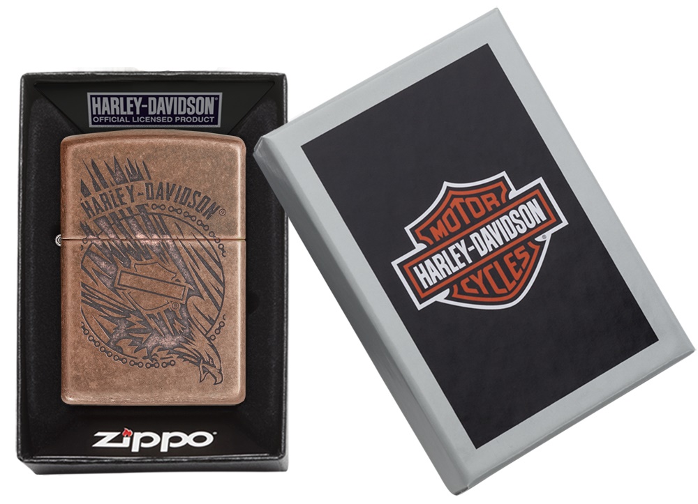 Front shot of Zippo Bejeweled Beetle Design High Polish Brass Windproof Lighter standing at a 3/4 angle.