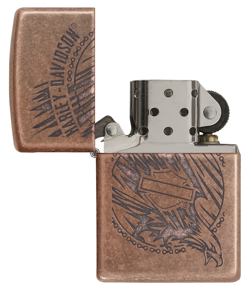 Front shot of Zippo Bejeweled Beetle Design High Polish Brass Windproof Lighter standing at a 3/4 angle.