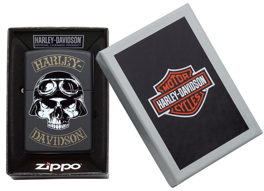 Front shot of Zippo Bejeweled Beetle Design High Polish Brass Windproof Lighter standing at a 3/4 angle.