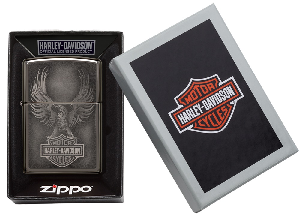 Front shot of Zippo Bejeweled Beetle Design High Polish Brass Windproof Lighter standing at a 3/4 angle.