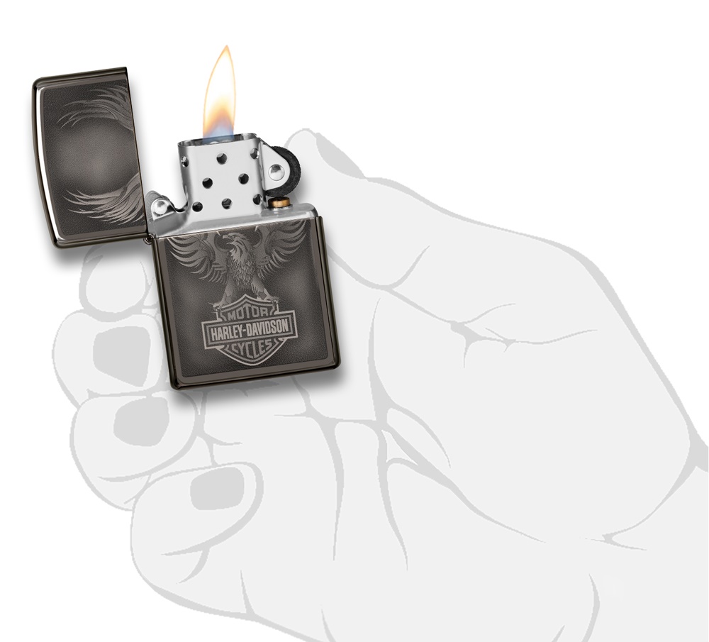 Front shot of Zippo Bejeweled Beetle Design High Polish Brass Windproof Lighter standing at a 3/4 angle.