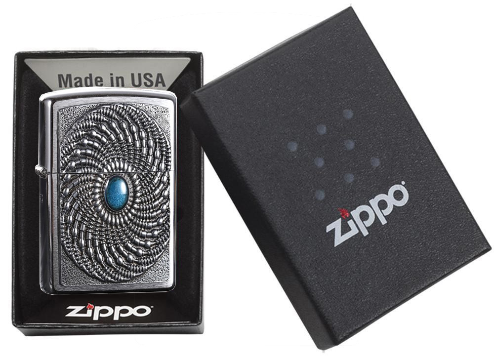 Front shot of Zippo Bejeweled Beetle Design High Polish Brass Windproof Lighter standing at a 3/4 angle.