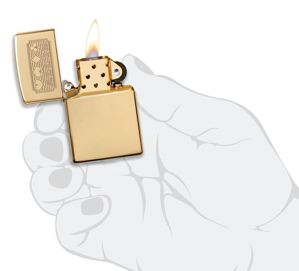 Front shot of Zippo Bejeweled Beetle Design High Polish Brass Windproof Lighter standing at a 3/4 angle.