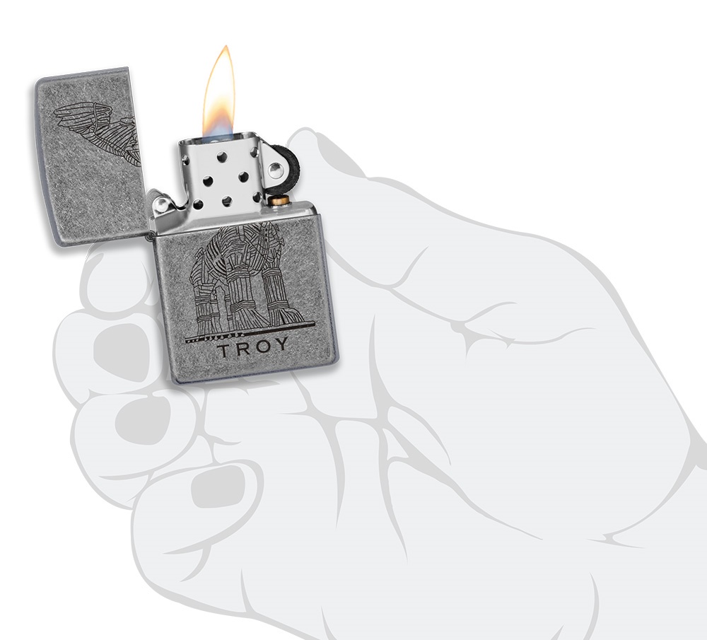 Front shot of Zippo Bejeweled Beetle Design High Polish Brass Windproof Lighter standing at a 3/4 angle.