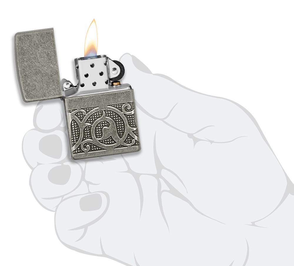 Front shot of Zippo Bejeweled Beetle Design High Polish Brass Windproof Lighter standing at a 3/4 angle.