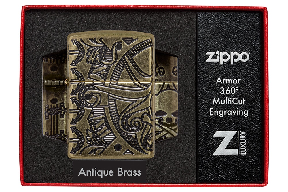Front shot of Zippo Bejeweled Beetle Design High Polish Brass Windproof Lighter standing at a 3/4 angle.