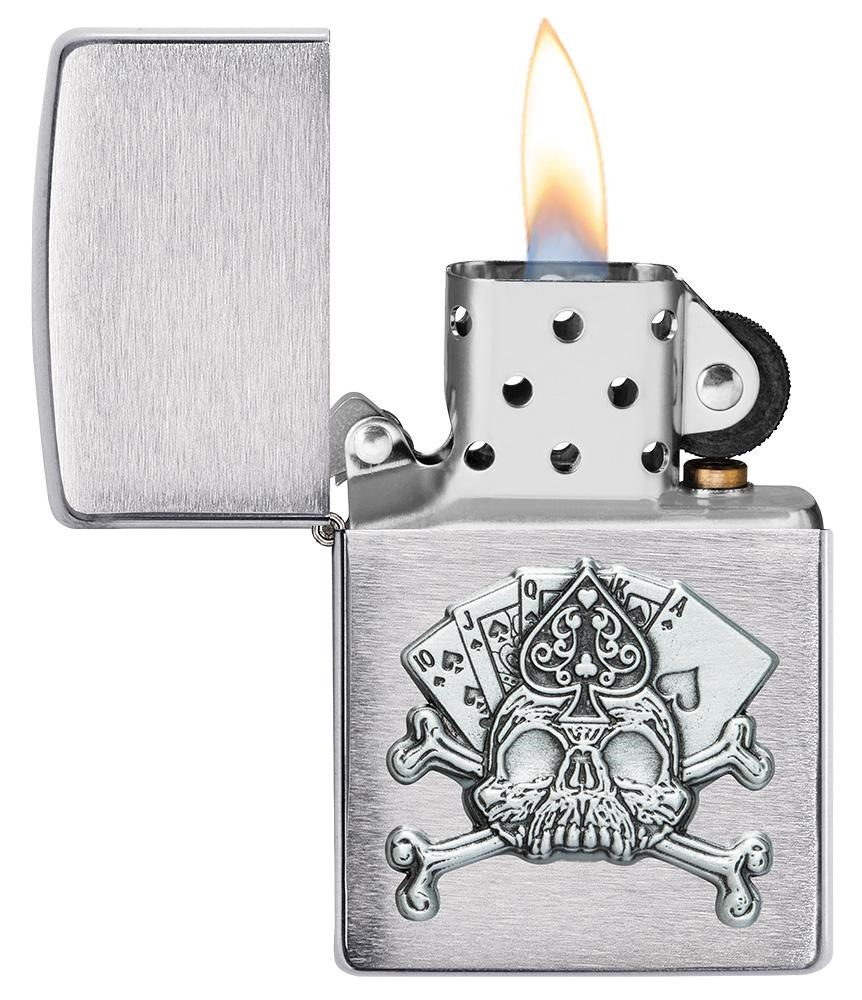 Front shot of Zippo Bejeweled Beetle Design High Polish Brass Windproof Lighter standing at a 3/4 angle.