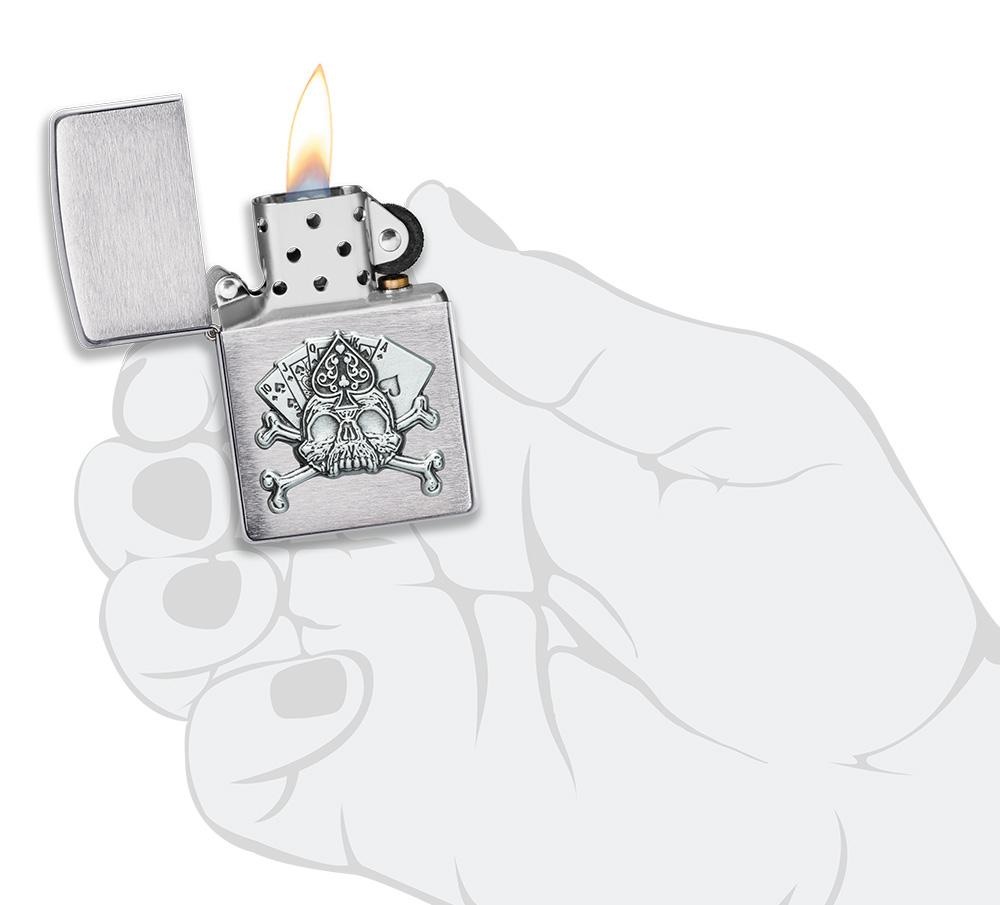 Front shot of Zippo Bejeweled Beetle Design High Polish Brass Windproof Lighter standing at a 3/4 angle.