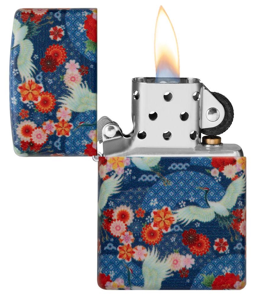 Front shot of Zippo Bejeweled Beetle Design High Polish Brass Windproof Lighter standing at a 3/4 angle.