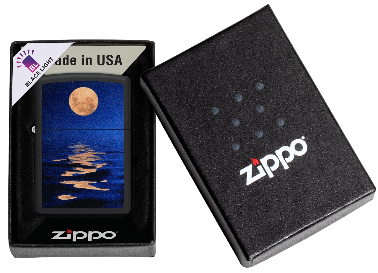 Front shot of Zippo Bejeweled Beetle Design High Polish Brass Windproof Lighter standing at a 3/4 angle.