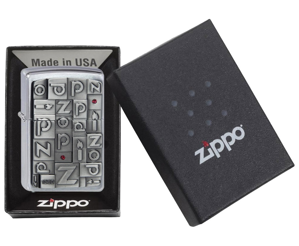 Front shot of Zippo Bejeweled Beetle Design High Polish Brass Windproof Lighter standing at a 3/4 angle.