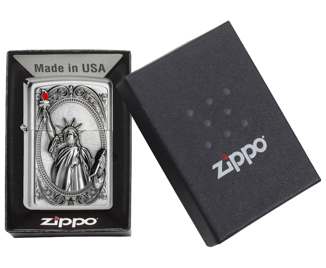 Front shot of Zippo Bejeweled Beetle Design High Polish Brass Windproof Lighter standing at a 3/4 angle.