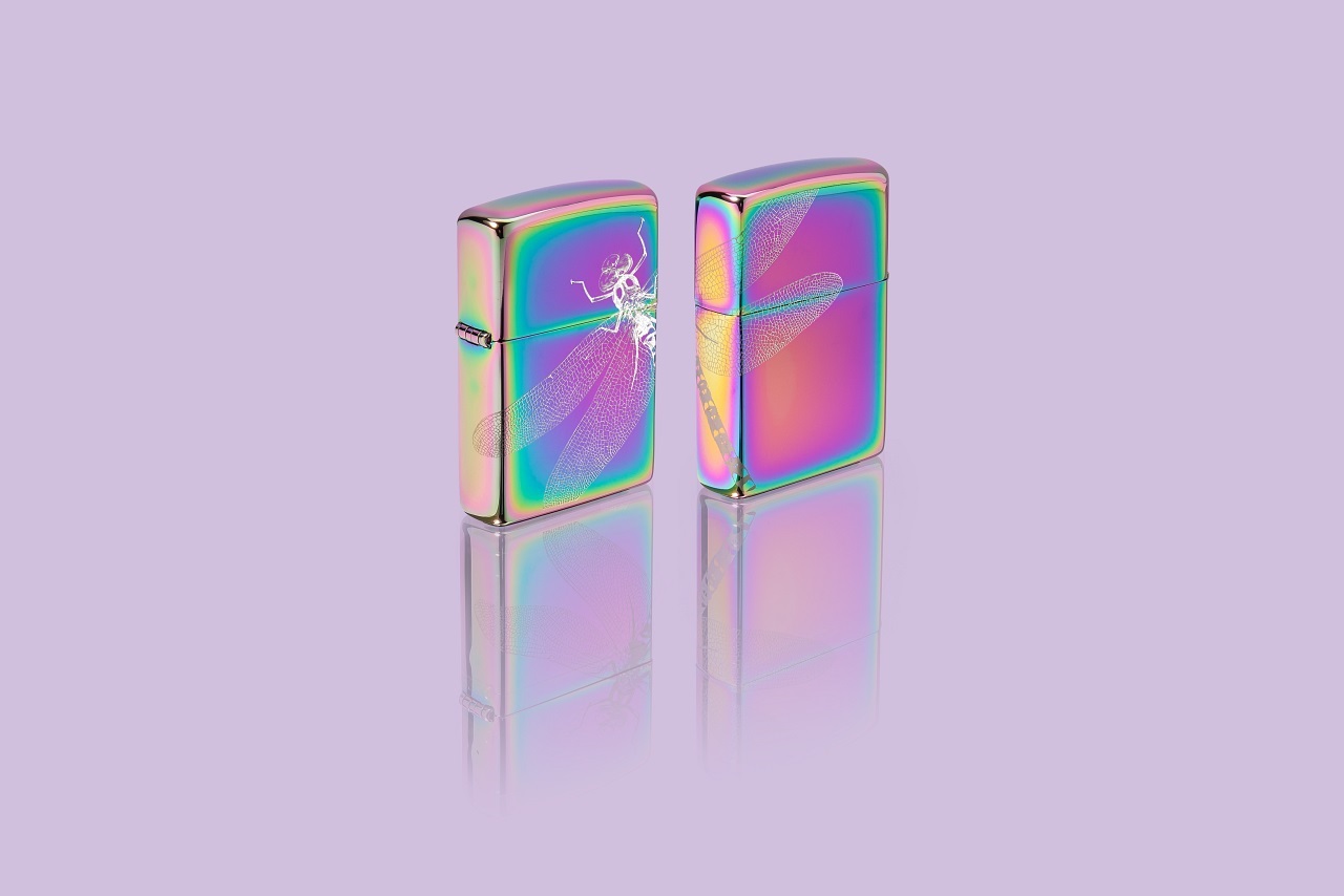 Front shot of Zippo Bejeweled Beetle Design High Polish Brass Windproof Lighter standing at a 3/4 angle.