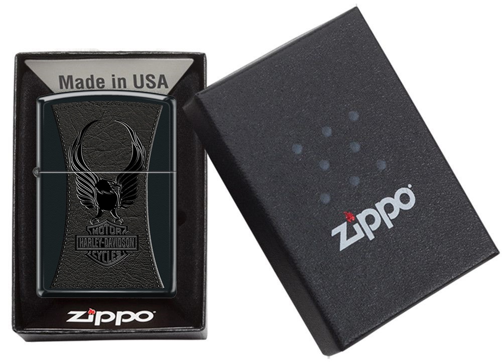 Front shot of Zippo Bejeweled Beetle Design High Polish Brass Windproof Lighter standing at a 3/4 angle.