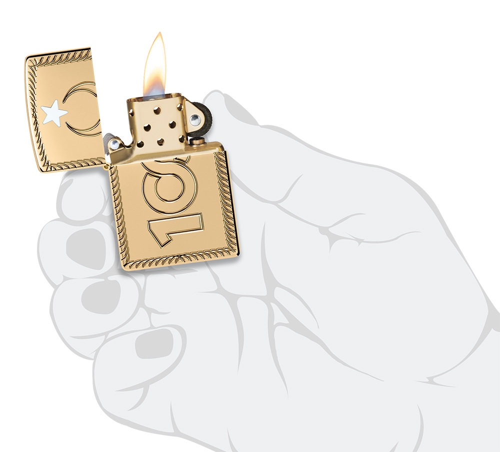 Front shot of Zippo Bejeweled Beetle Design High Polish Brass Windproof Lighter standing at a 3/4 angle.
