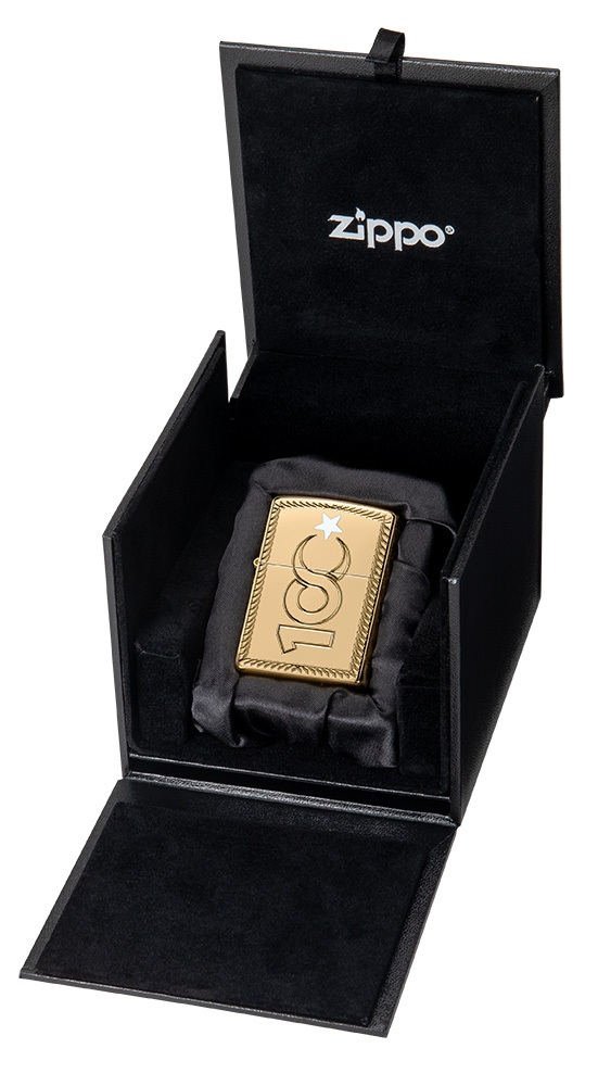 Front shot of Zippo Bejeweled Beetle Design High Polish Brass Windproof Lighter standing at a 3/4 angle.