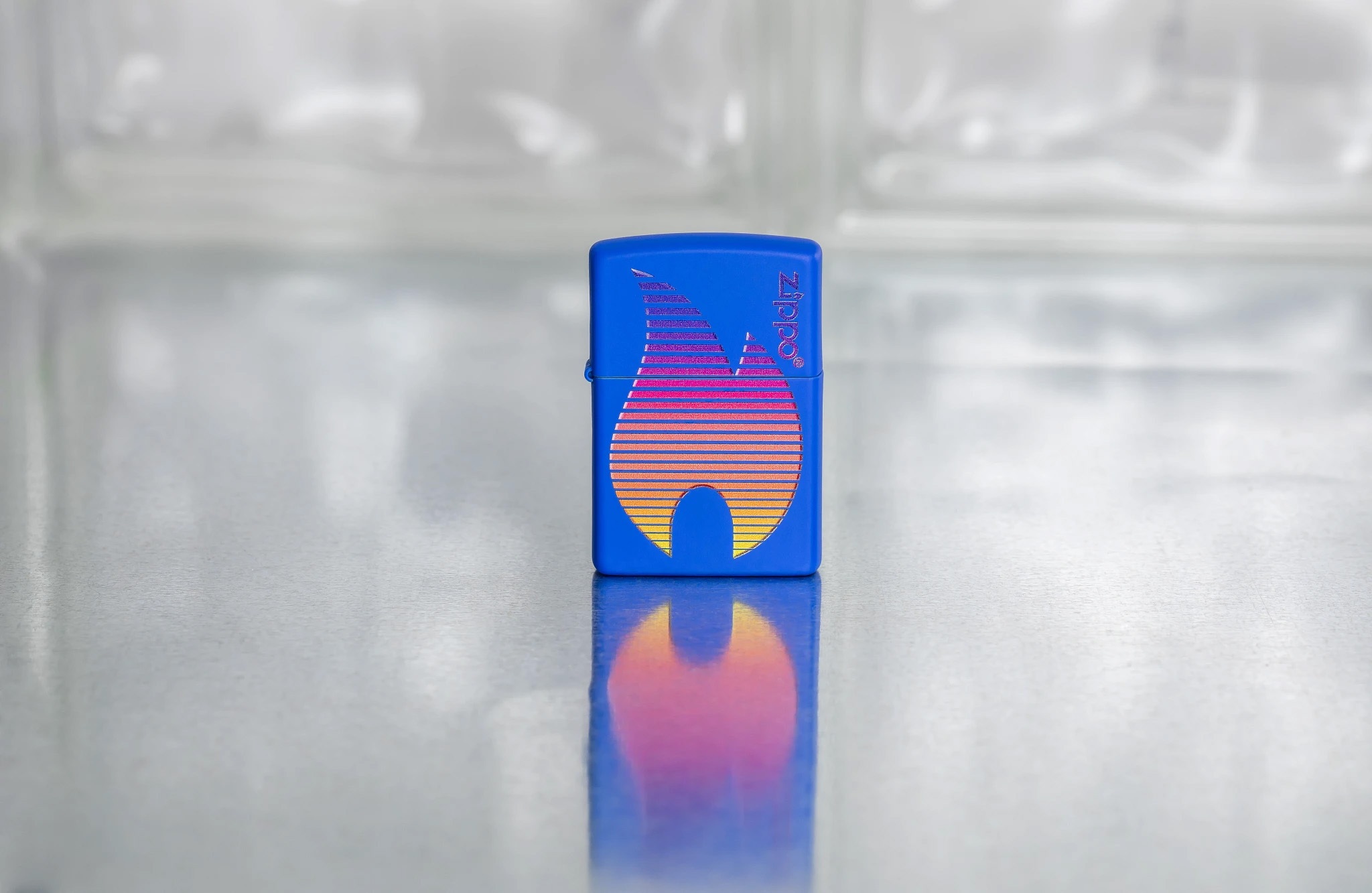 Front shot of Zippo Bejeweled Beetle Design High Polish Brass Windproof Lighter standing at a 3/4 angle.