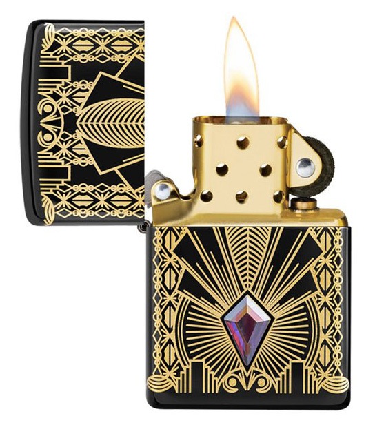 Front shot of Zippo Bejeweled Beetle Design High Polish Brass Windproof Lighter standing at a 3/4 angle.