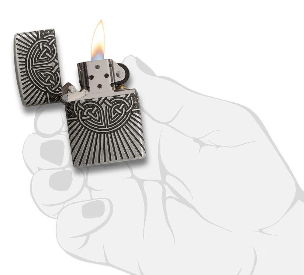Front shot of Zippo Bejeweled Beetle Design High Polish Brass Windproof Lighter standing at a 3/4 angle.