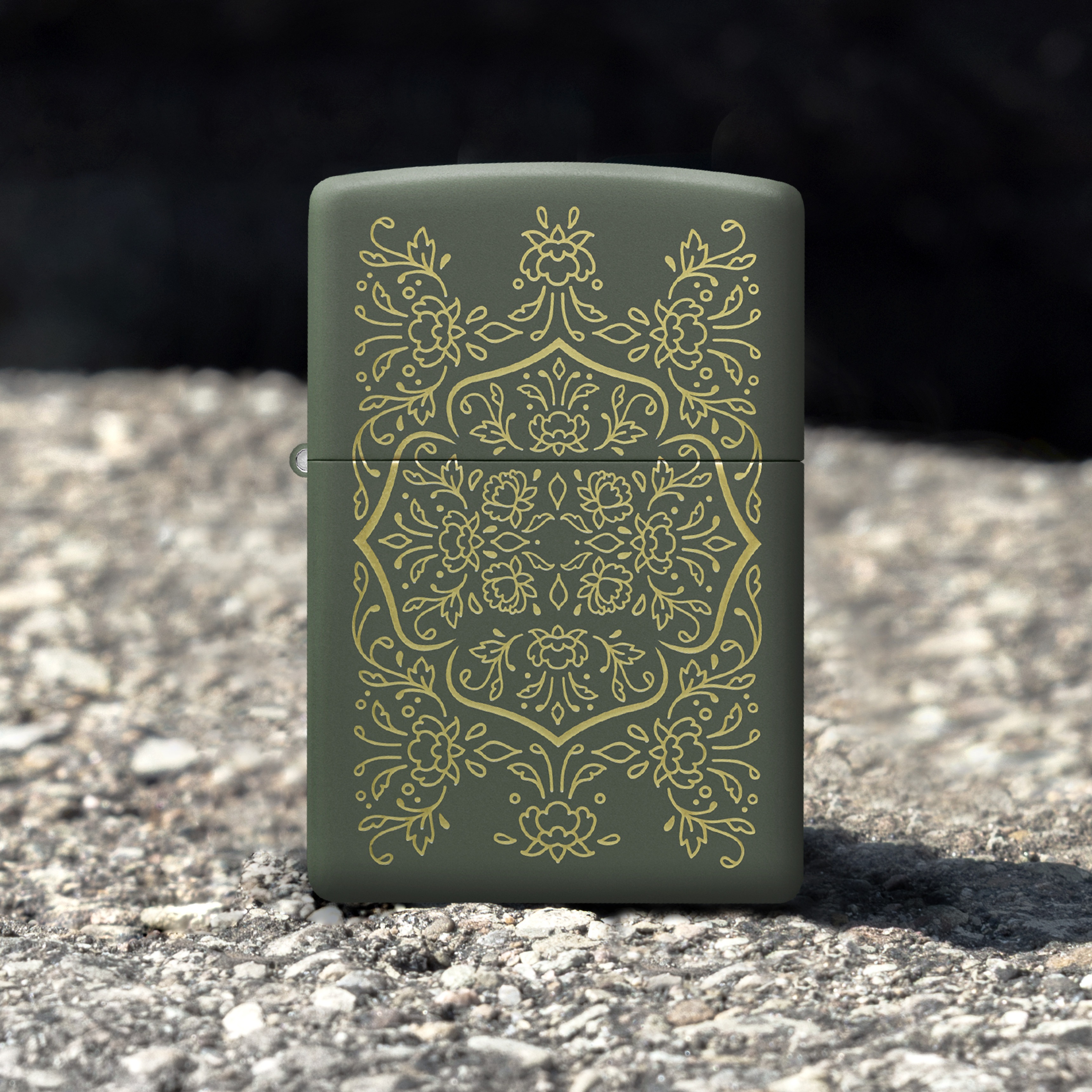 Front shot of Zippo Bejeweled Beetle Design High Polish Brass Windproof Lighter standing at a 3/4 angle.