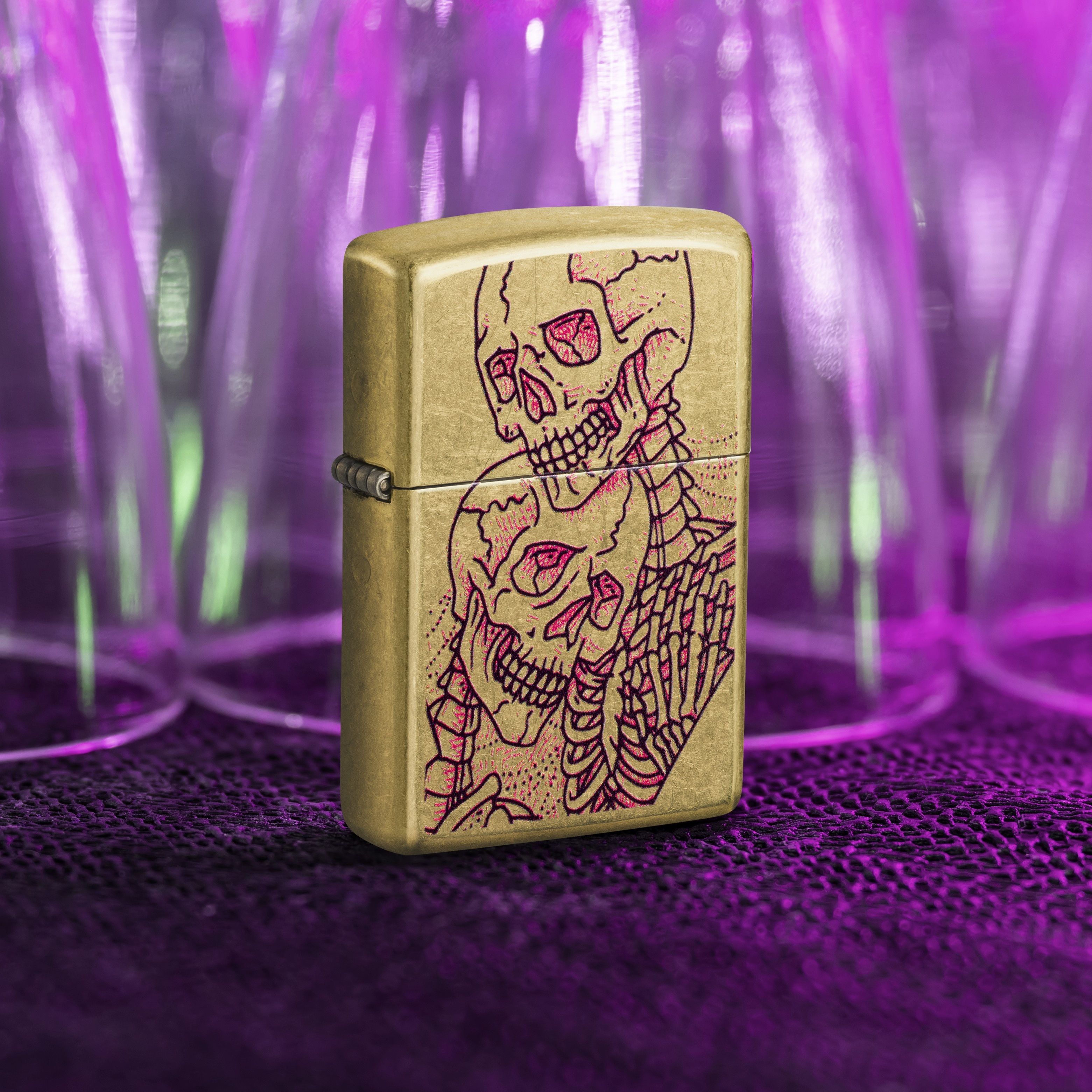 Front shot of Zippo Bejeweled Beetle Design High Polish Brass Windproof Lighter standing at a 3/4 angle.