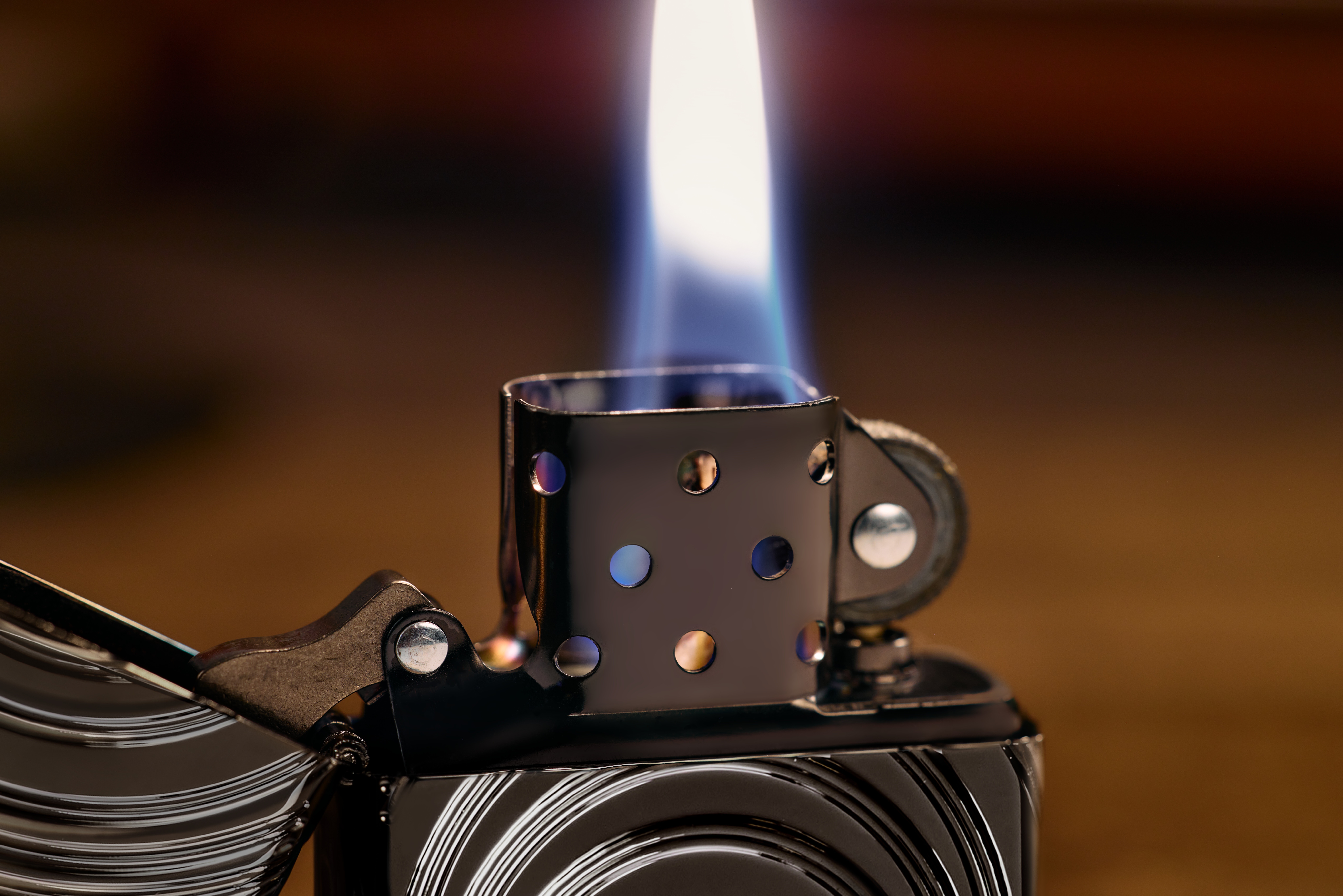 Front shot of Zippo Bejeweled Beetle Design High Polish Brass Windproof Lighter standing at a 3/4 angle.