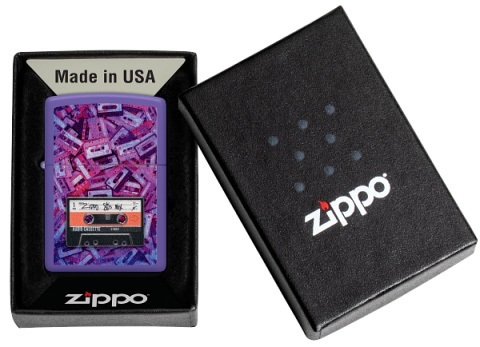 Front shot of Zippo Bejeweled Beetle Design High Polish Brass Windproof Lighter standing at a 3/4 angle.