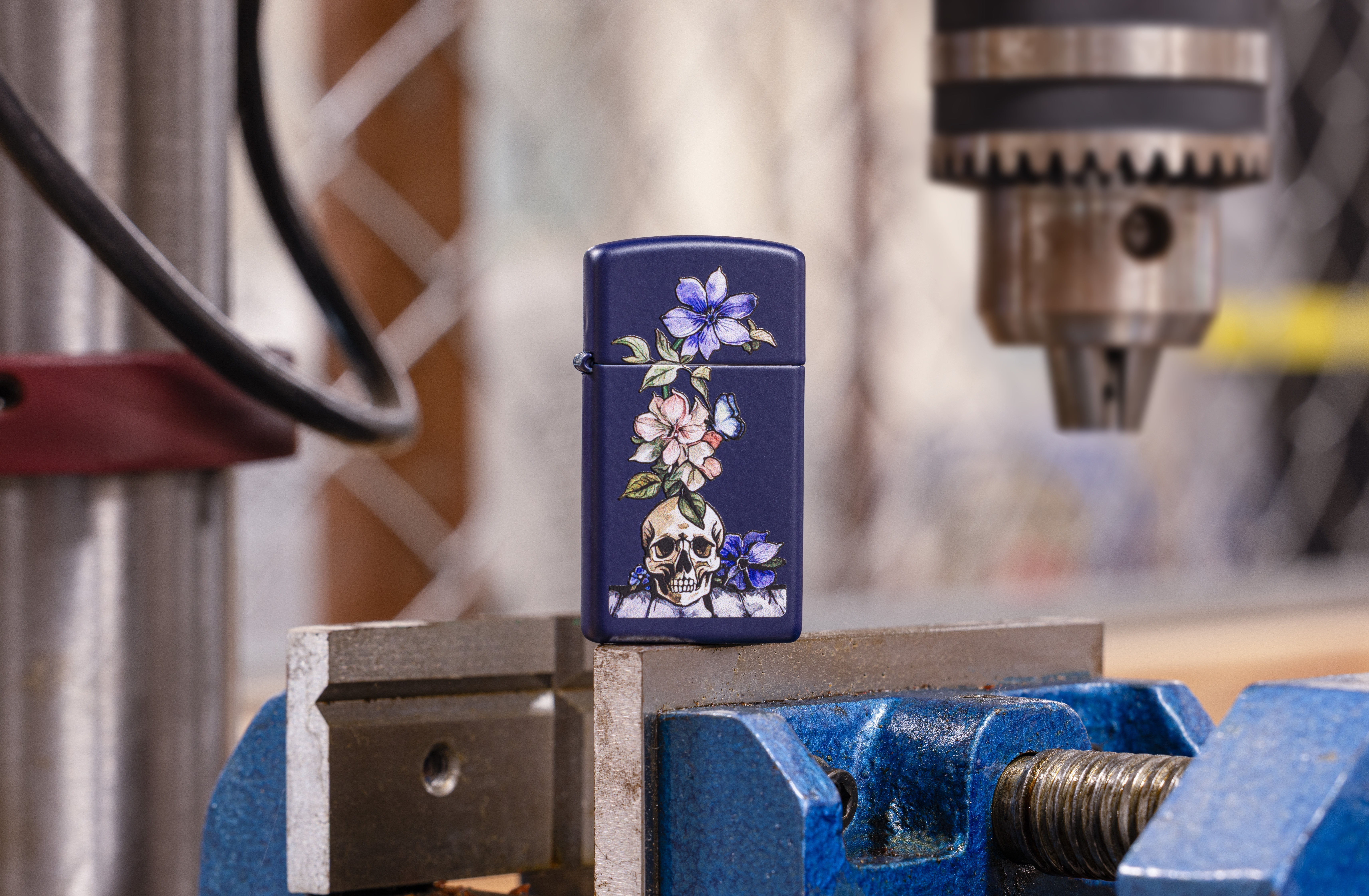 Front shot of Zippo Bejeweled Beetle Design High Polish Brass Windproof Lighter standing at a 3/4 angle.