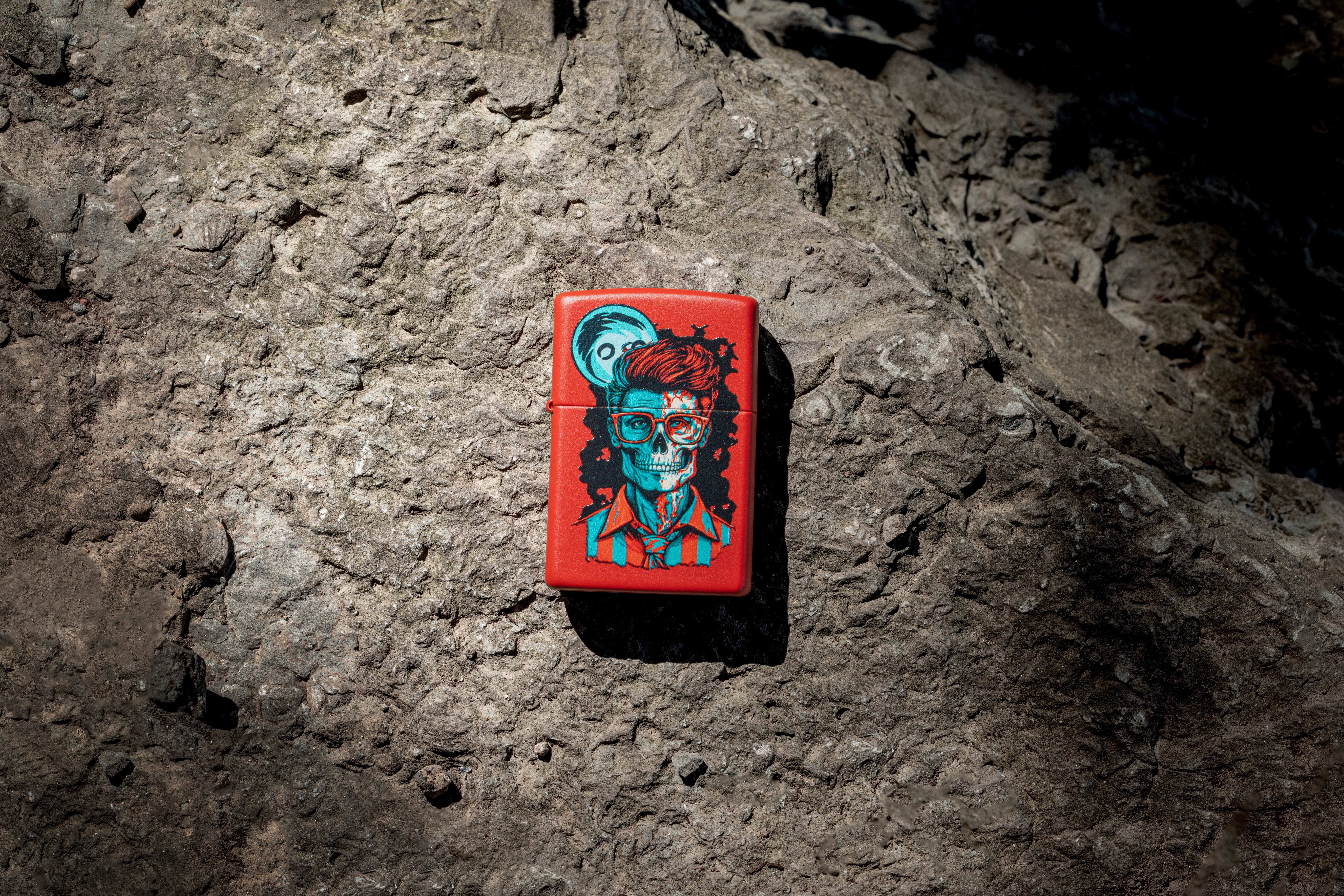 Front shot of Zippo Bejeweled Beetle Design High Polish Brass Windproof Lighter standing at a 3/4 angle.