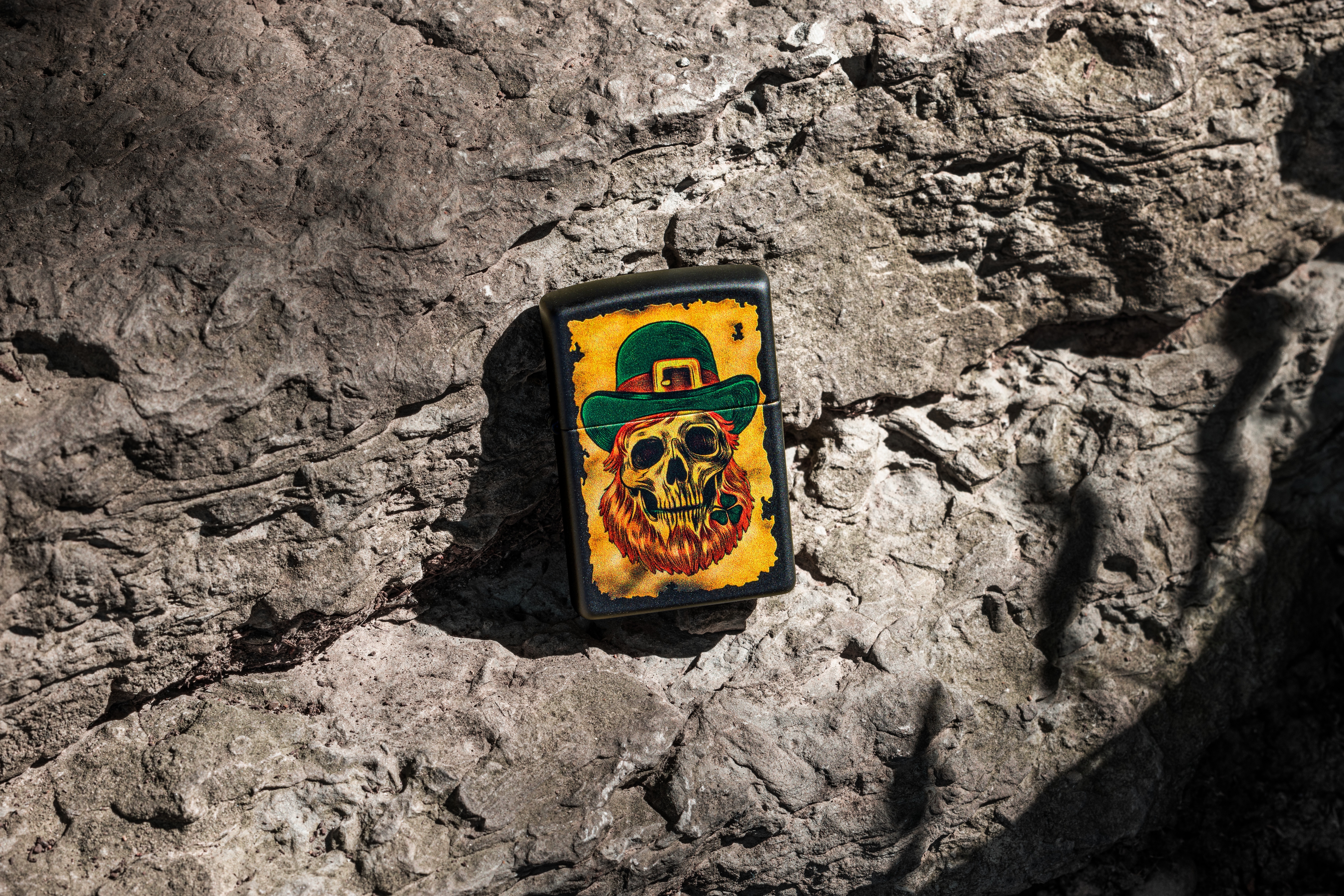 Front shot of Zippo Bejeweled Beetle Design High Polish Brass Windproof Lighter standing at a 3/4 angle.
