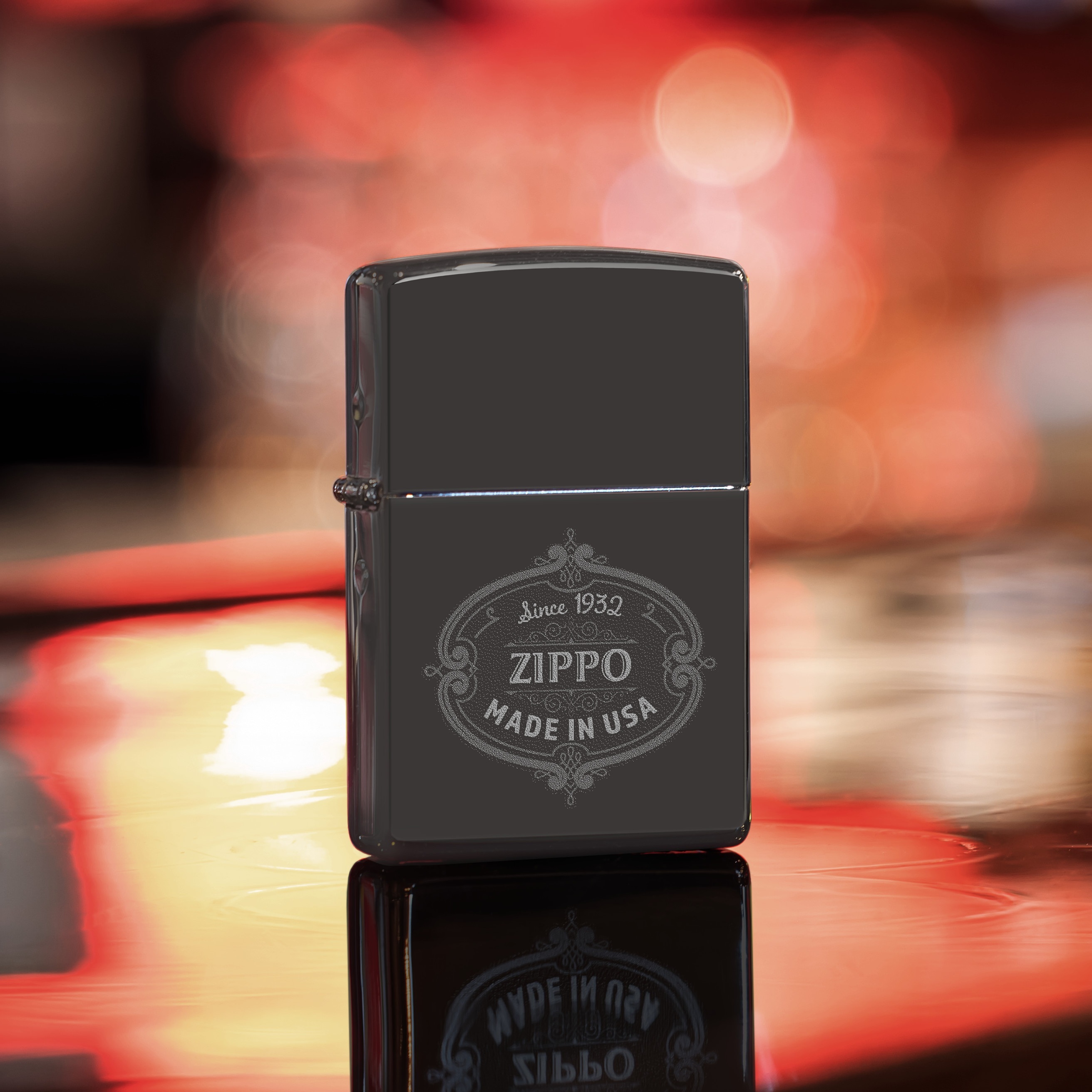 Front shot of Zippo Bejeweled Beetle Design High Polish Brass Windproof Lighter standing at a 3/4 angle.