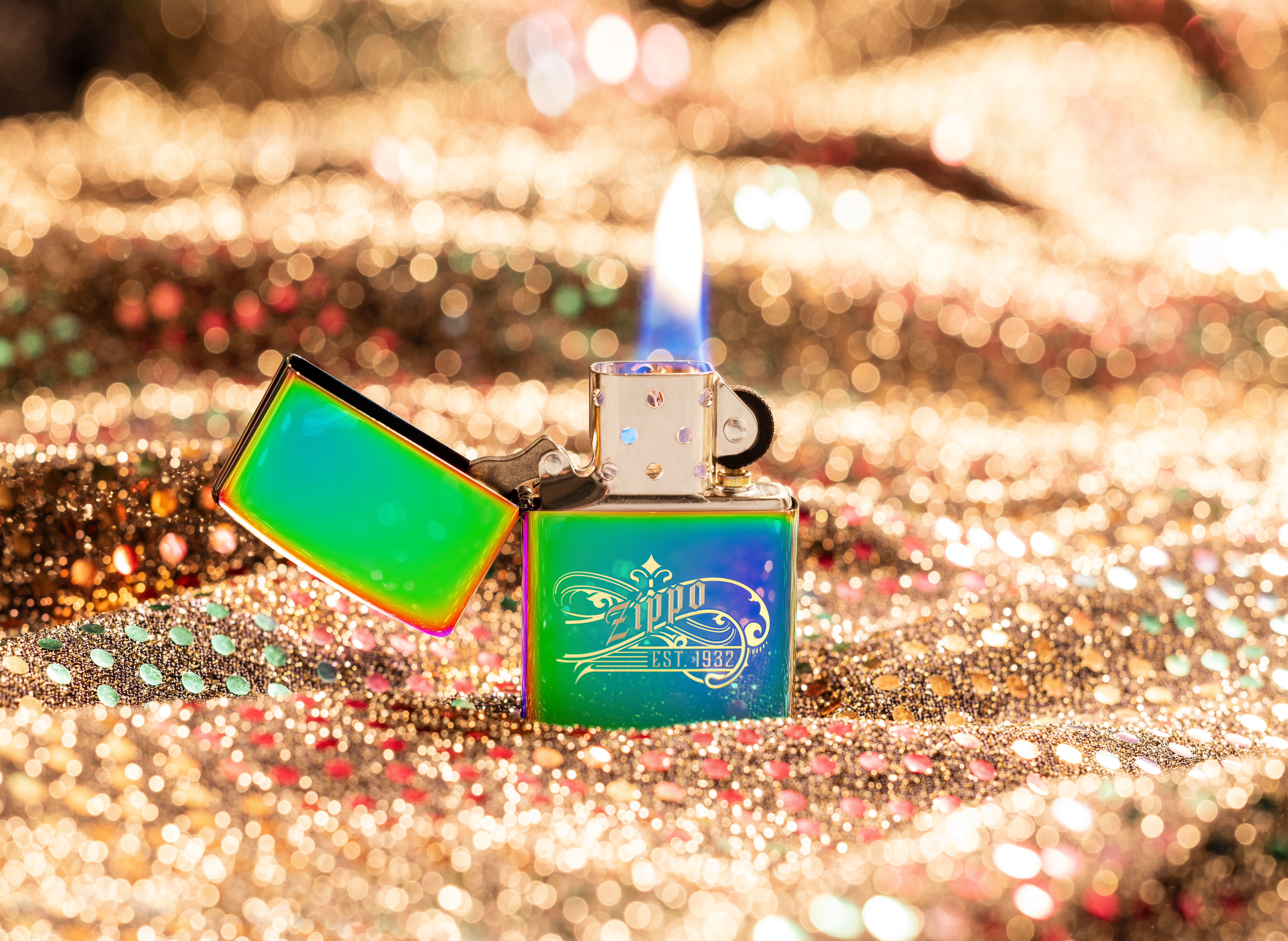 Front shot of Zippo Bejeweled Beetle Design High Polish Brass Windproof Lighter standing at a 3/4 angle.