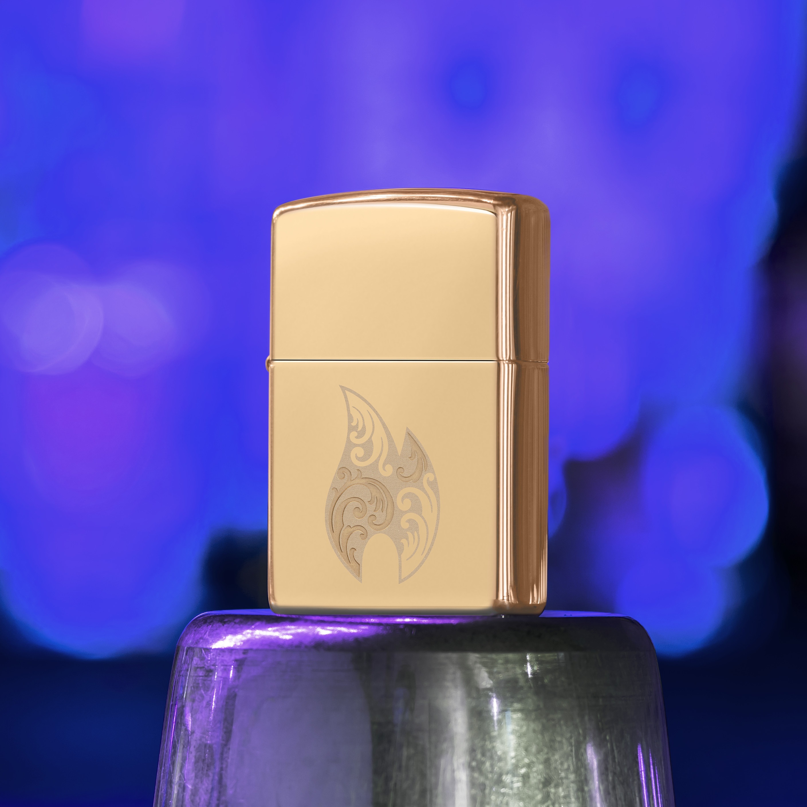 Front shot of Zippo Bejeweled Beetle Design High Polish Brass Windproof Lighter standing at a 3/4 angle.