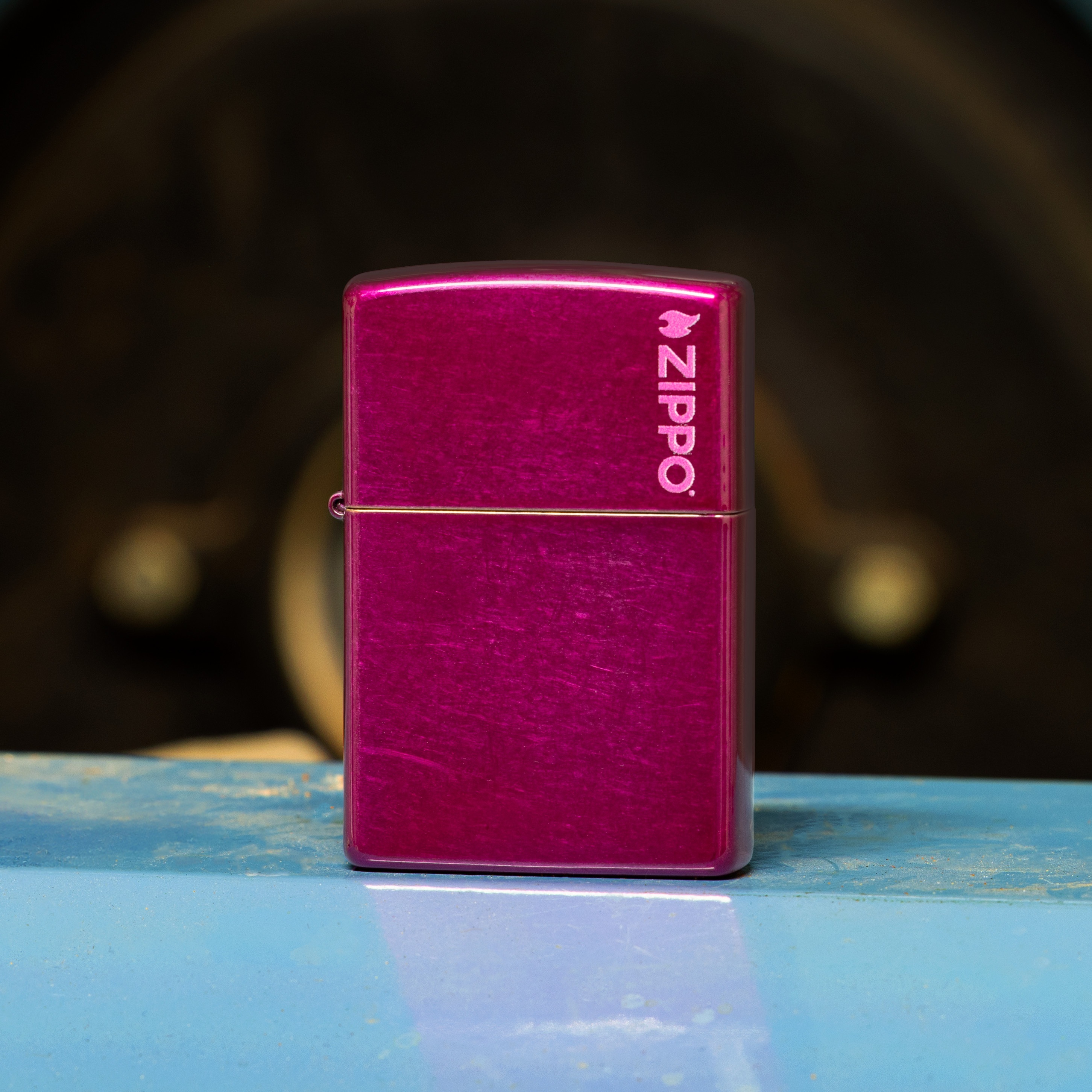 Front shot of Zippo Bejeweled Beetle Design High Polish Brass Windproof Lighter standing at a 3/4 angle.